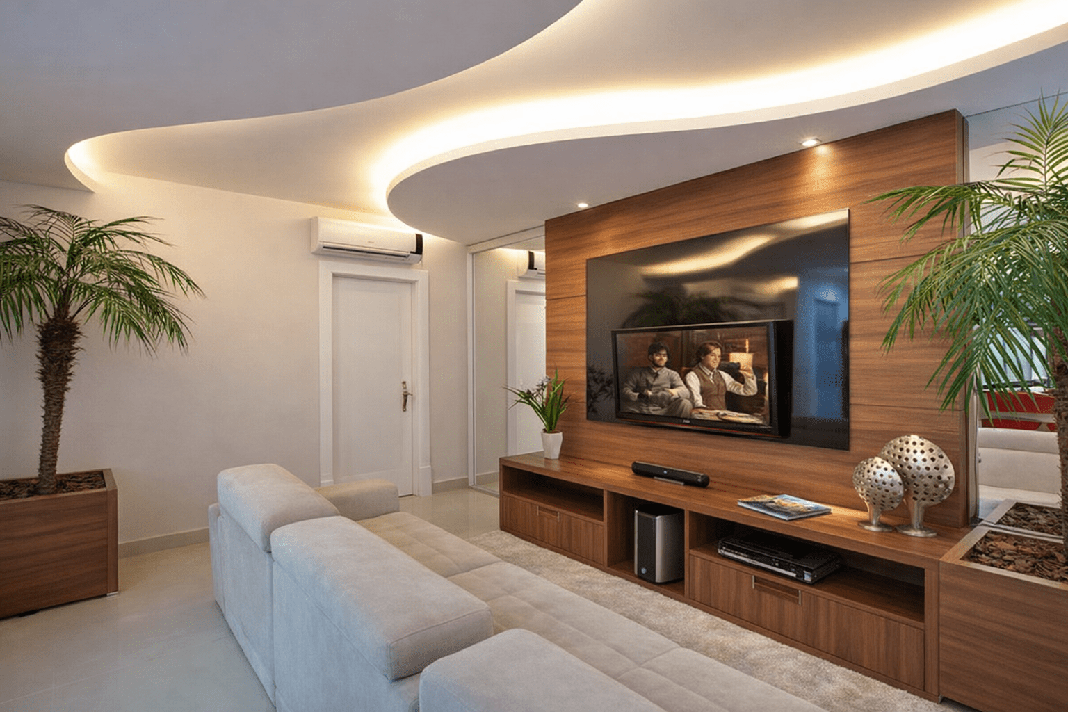 Sala de estar moderna com forro de gesso em Uberlândia, iluminação embutida e acabamento curvo executado pela Drywall Uberlândia